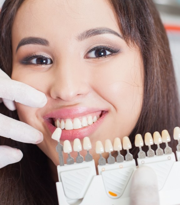 Young woman being fitted for dental veneers