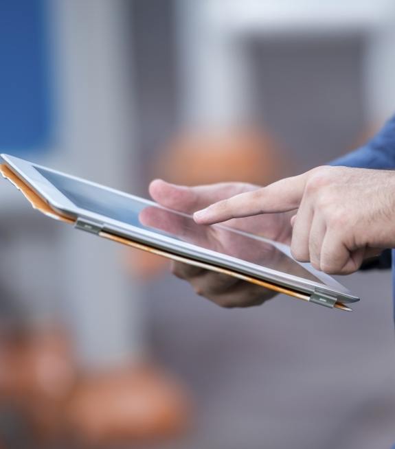 Person scrolling on a tablet