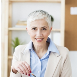 Smiling woman with short gray hair